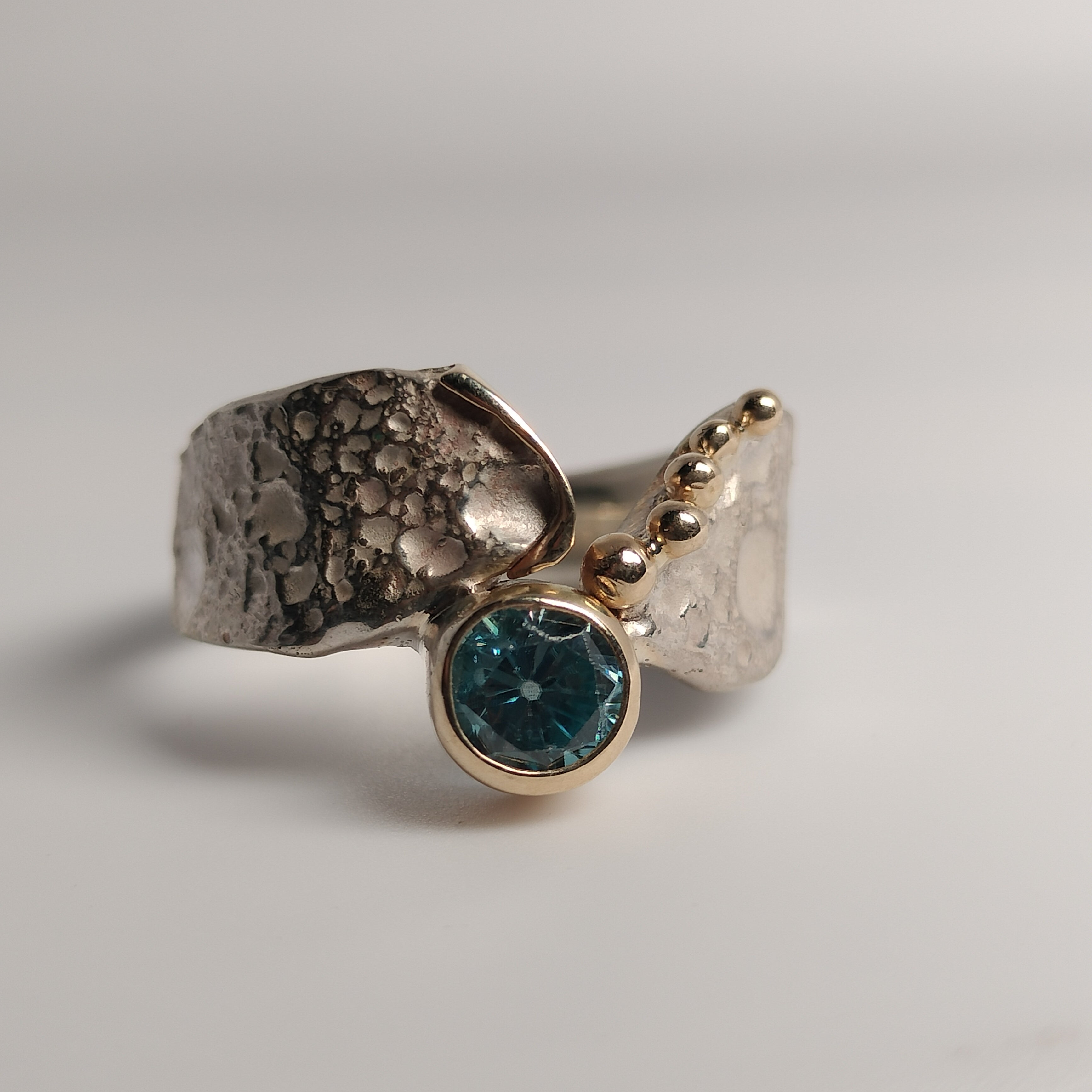 Sterling Silver and 14k Gold Blue Zircon Ring